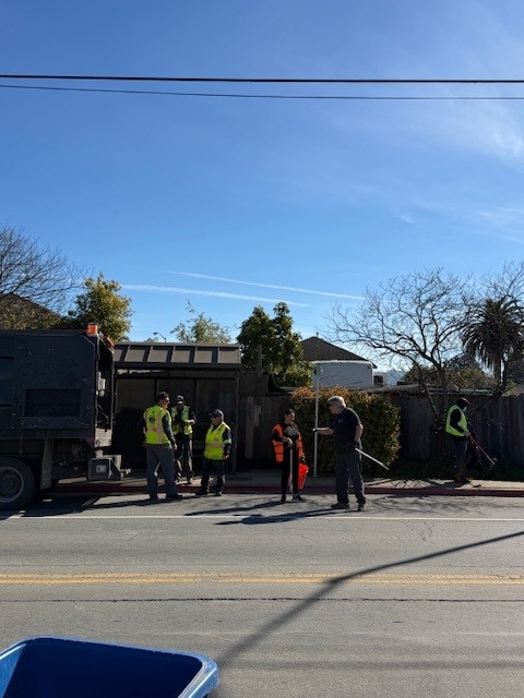Volunteers are cleaning the road